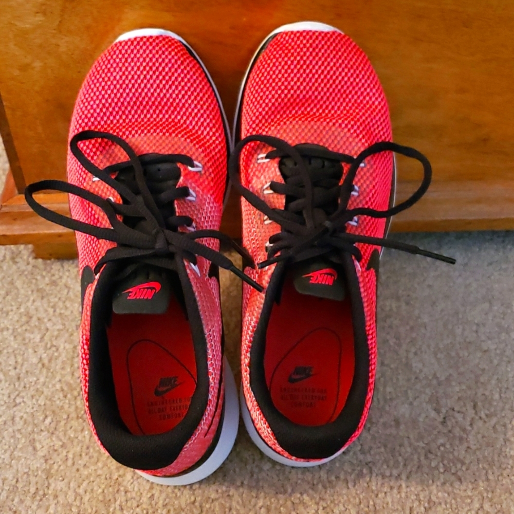 Nike neon pink Running Shoes Women’s 8.  These shoes are lightly worn by me.